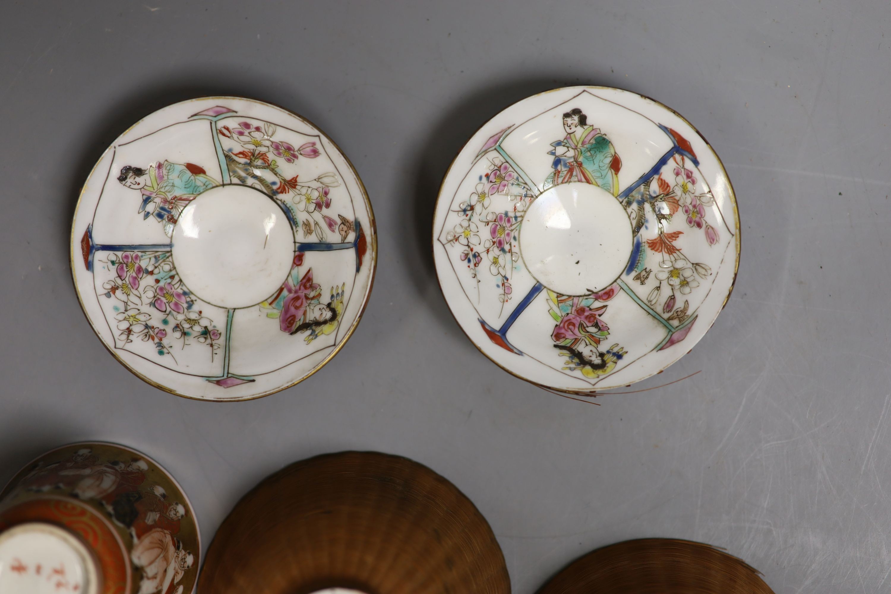 A Japanese ivory manju shaped okimono, three cups & two saucers, all Meiji period.